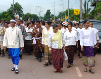 Jao Paw Guan (left) leads the village elders